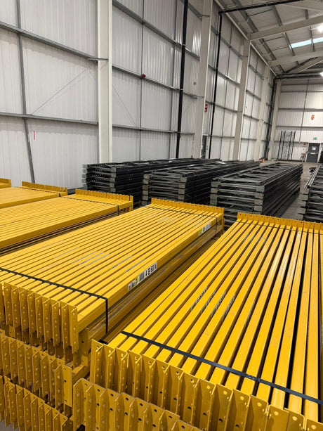 Used pallet racking beams stored in a warehouse