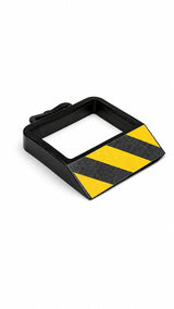 Wheel chock angled view showing wedge profile and hazard stripe