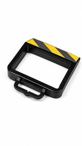 Wheel chock top-down view showing hollow frame and integrated handle