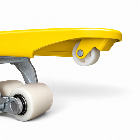 Entry guide roller in the tip of the yellow fork, with the tandem load rollers behind it