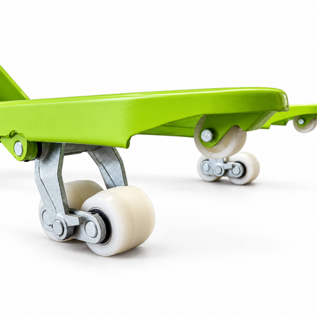 Entry guide roller in the tip of the lime green fork, with the tandem load rollers behind it
