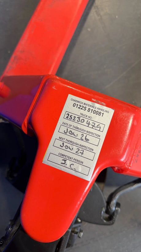 Inspection label on used Chadwick pallet truck