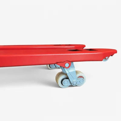 Red fork tip of the 2000kg pallet truck fitted with paired tandem load rollers