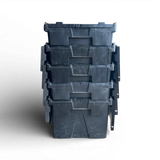Stack of black plastic storage bins on a white background